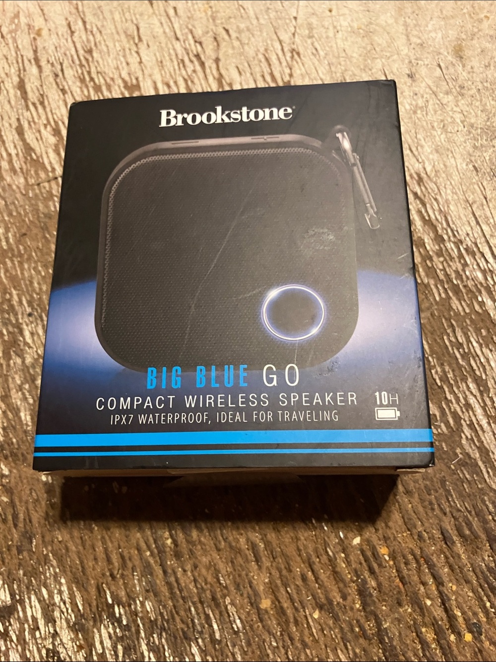 Brookstone Black Portable Bluetooth Speaker with Blue Accent